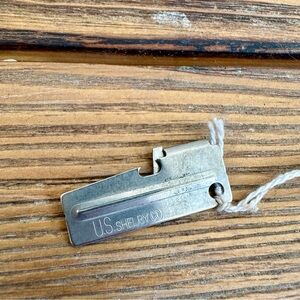 NEW P38 U.S. Shelby Co. Silver Bottle Opener